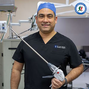 Dr. Luis Cazares With Equipment